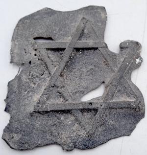 Star of David plate part recovered in Ghetto Krakow near Auschwitz